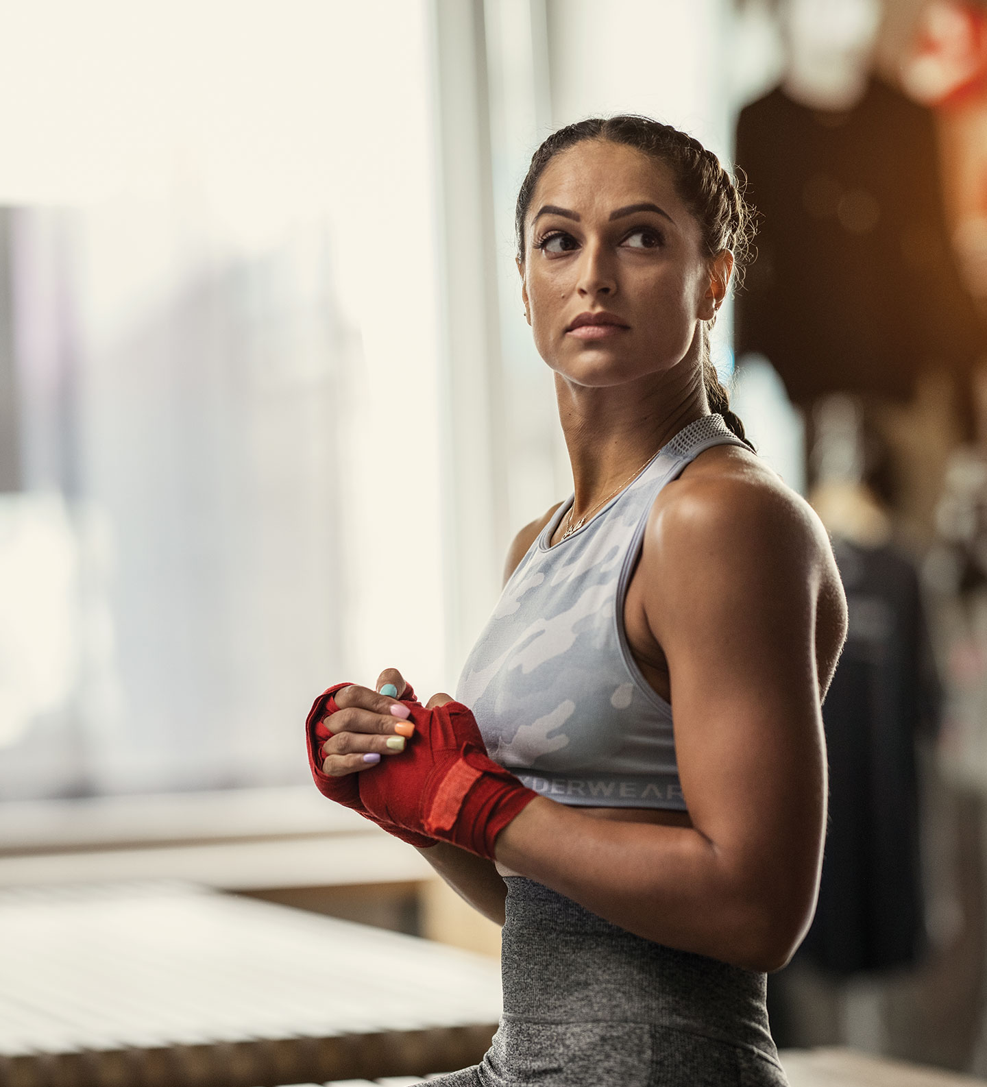Determined lady in boxing outfit 